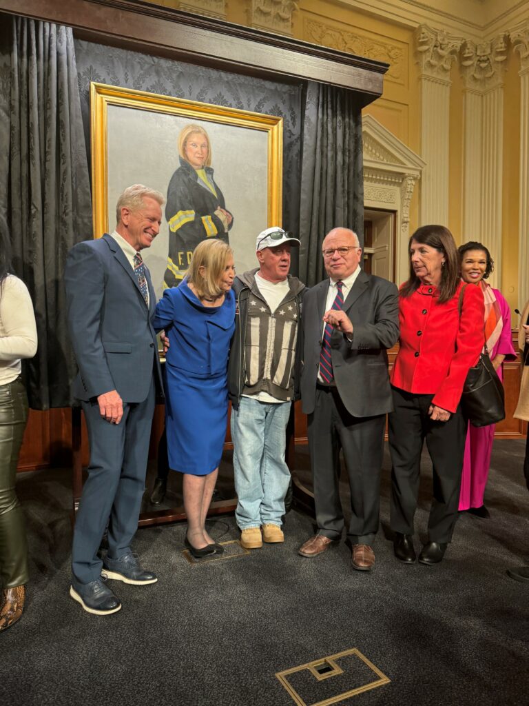 Richard Alles, former FDNY and former Citizens Board Member, with former Congresswoman Carolyn Maloney, John Feal, 9/11 Advocate, Benjamin Chevat, former Chief of Staff to the Congresswoman and now Executive Director of Citizens for the Extension of the James Zadroga Act and Suzy Ballantyne, Deputy Director of Citizens for the Extension of the James Zadroga Act.